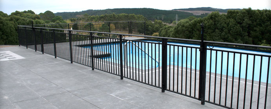 iron fence near pool example